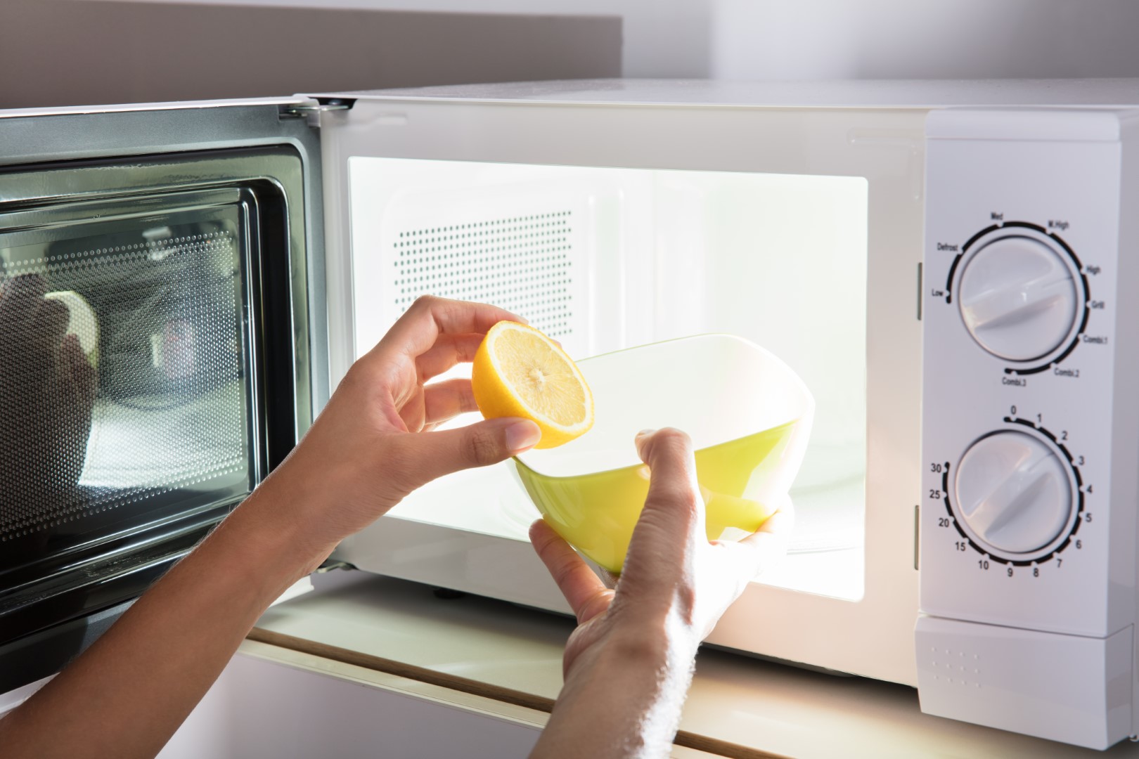 Cleaning microwave with lemon and water